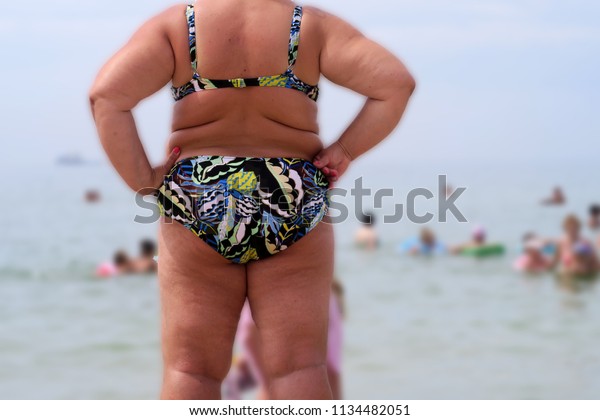 cath taylor recommends fat chick beach pic