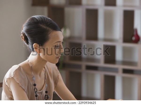 Japanese Mature Woman taking confessions