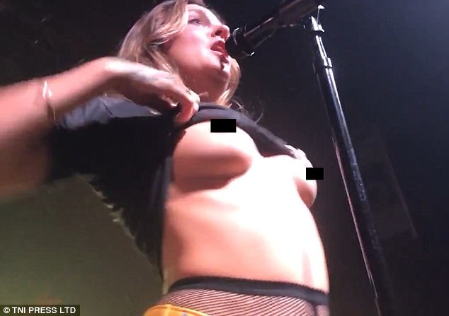 dora peguero add photo women flashing at concerts