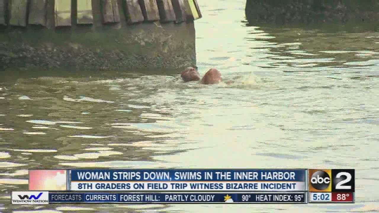 woman swimming naked