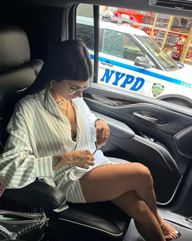 charles coston recommends mia khalifa in car pic