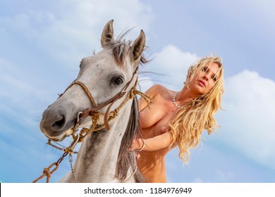 andrew renaldy recommends nude women on horseback pic